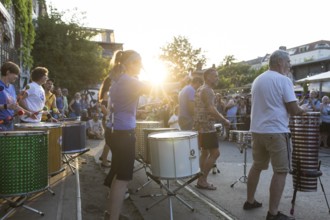 The band Berlin Percussion plays on the RAW grounds as part of the Fête de la Musique. The music