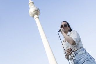 Singer Veronika Bognar on Alexanderplatz as part of the Fête de la Musique. The music event, which
