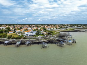 Fishing huts over Randonnee entre Histoire et Nature from a drone, Fouras, Fouras-les-Bains,