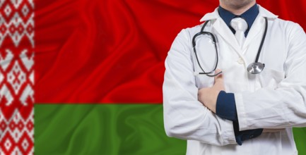 Male doctor with stethoscope on Belarus flag. Doctor holding stethoscope on Belarus flag