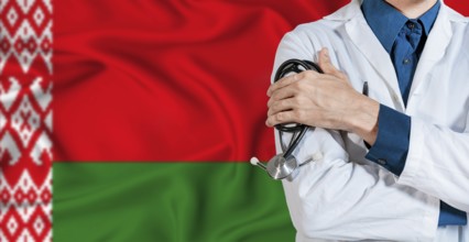 Doctor with stethoscope on Belarus flag. Doctor holding stethoscope on Belarus flag