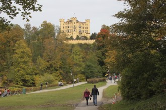 Hohenschwangau Castle near Füssen in autumn, with hiking trail to the Alpsee, Allgäu, Bavaria,