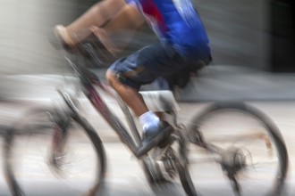 Man riding a bicycle, Photo with motion blur, City of Quito, Pichincha province, Ecuador, South