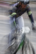 Man riding a bicycle, Photo with motion blur, City of Quito, Pichincha province, Ecuador, South
