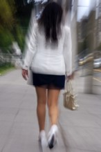 Woman walking in street, Photo with motion blur, City of Quito, Pichincha province, Ecuador, South