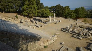Wide angle view of an ancient landscape with ruins and trees under a clear sky, open staircase,