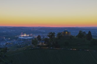 View of a chapel and town at sunset, with lights and vineyards, grave chapel, Zum Württemberg,