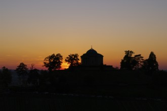 Silhouette of a chapel with trees in the sunset, quiet and peaceful atmosphere, Zum Württemberg,
