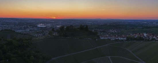 Panoramic view of the city with vineyards and houses in the foreground at sunset, grave chapel, Zum