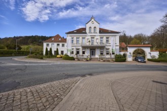 Hotel and restaurant Wittekindsquelle, building, pavement, concrete paving stones, asphalt road,
