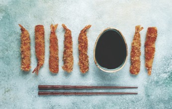 Fried tiger prawns in tempura, top view, soy sauce, chopsticks