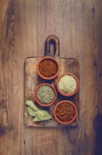 Georgian spices, in ceramic bowls, assortment, set of spices, utsho, adjika, Svan salt, ground