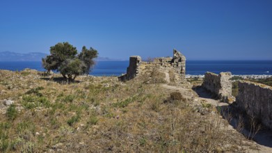 Ruins overlooking the sea under a clear blue sky, Kardamina, Antimacheia, Medieval Fortress, St