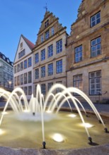 Old market with fountain and town houses in the evening, Bielefeld, East Westphalia-Lippe, North