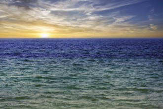 Turquoise blue sea, calm water surface, sunset, offshore island of Heligoland, Schleswig-Holstein,