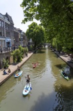 The old town centre of Utrecht, Oudegracht, around 2 km long with many old houses, shops,