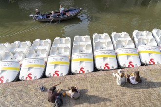 The old town centre of Utrecht, Oudegracht, around 2 km long with many old houses, pedal boat hire,