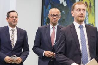 Olaf Lies (SPD, Minister President of Lower Saxony), Friedrich Merz (CDU, Federal Chancellor) and