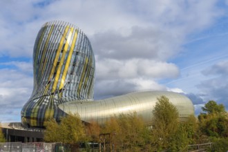 The cité du vin museum in bordeaux, france, showcases the city's rich wine heritage with its
