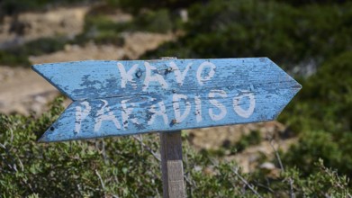 Beach, Kavo Paradiso, Paradise Beach, Blue wooden sign with the inscription 'KAYO PARADISO' in