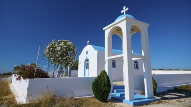 Chapel of Agios Charalambos, chapel with cross and bell tower in a natural setting, Kefalos, Kos,