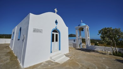 Chapel of Agios Charalambos, White chapel with blue detail and free-standing bell tower, Kefalos,