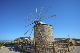 Stone windmill with a wide view under a clear blue sky, Kefalos, Kos, Dodecanese, Greek Islands,