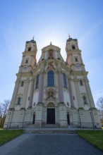 East tower of the baroque Basilica of St Alexander and Theodor, backlit, Ottobeuren Monastery,