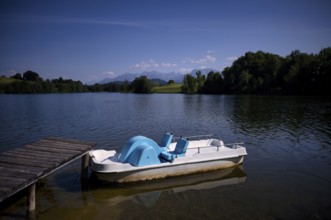 Pedal boat in a swimming lake, lake, swimming lake, Schwaltenweiher near Seeg, Ostallgäu, Allgäu,