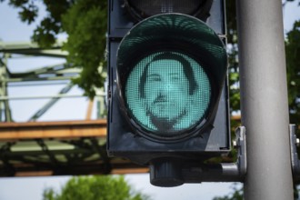 Portrait of Friedrich Engels on a pedestrian traffic light in Wuppertal, Germany