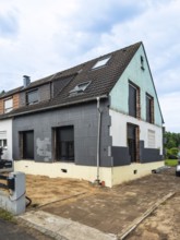 Renovation of a detached house with insulation of the façade with polystyrene panels in Hilden,