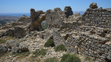 Stone ruins overlook a vast landscape under a clear sky, Abandoned Village, Lost Place, Pyli, Paleo