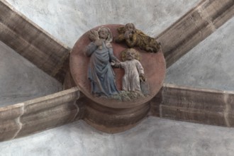 Mary dragging the infant Jesus into the school, keystone in the altar vault of the Church of Our