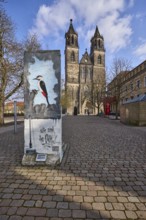 Part of the Berlin Wall, memorial to the fall of the Berlin Wall, cathedral, blue sky, cumulus