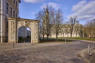 Stargate at the cathedral square, archway, bollards, monastery, church, bare winter trees, baroque
