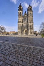 Cathedral, cobblestone square, blue sky, cumulus clouds, cathedral square, Magdeburg, state