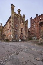 Old Diamant Brewery, brick building, historic brewery, ruin of a factory, diffuse light, cloudy,