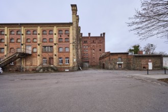 Old Diamant Brewery, brick building, historic brewery, ruin of a factory, diffuse light, cloudy,