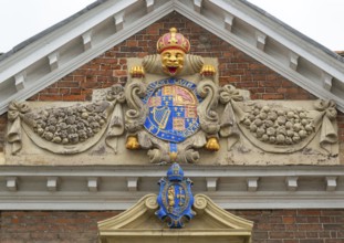 Royal Coat of Arms architectural detail, College of Matrons building, Salisbury, Wiltshire,