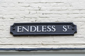 Sign on wall for Endless Street, Salisbury, Wiltshire, England, UK