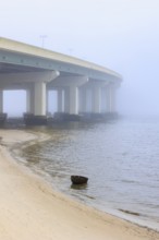 US Highway 90 bridge over the Biloxi Bay disappears into the dense fog at Ocean Springs,