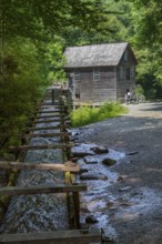 Wooden chute carries water to Mingus Mill to power grist mill for grinding corn in Great Smoky
