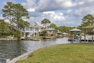 Waterfront homes with boat docks and boat lifts in the community of Timber Ridge in Pass Christian,