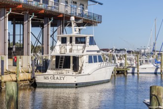 Private fishing boat at the dock below McElroy's Harbor House restaurant at the Biloxi Small Craft