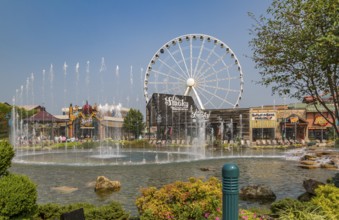 The Wheel ferris wheel behind the Ole Smoky Moonshine store at The Island recreation center in