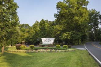 Covered wagon used for sign at the Up the Creek RV Camp campground in Pigeon Forge, Tennessee