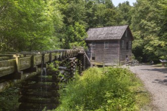 Wooden chute carries water to Mingus Mill to power grist mill for grinding corn in Great Smoky