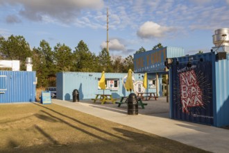 The Fort outdoor dining and entertainment hangout composed of repurposed shipping containers in