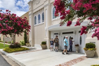 Visitors at the entrance to the Blue Bell Creameries Country Store and Ice Cream Parlor in