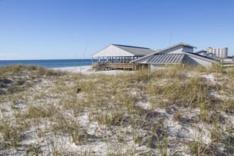 National Park Service sign welcomes visitors to the Rosamond Johnson Jr. Beach in the Perdido Key